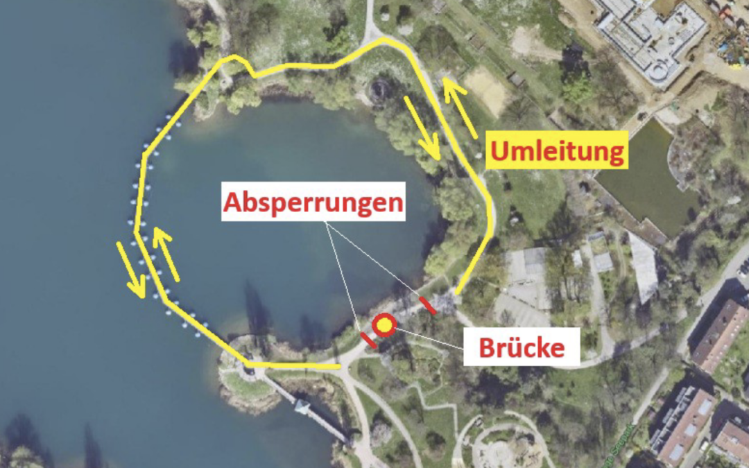Aerial map showing a yellow detour around a lake, with barriers labeled Absperrungen and a nearby Umleitung sign.