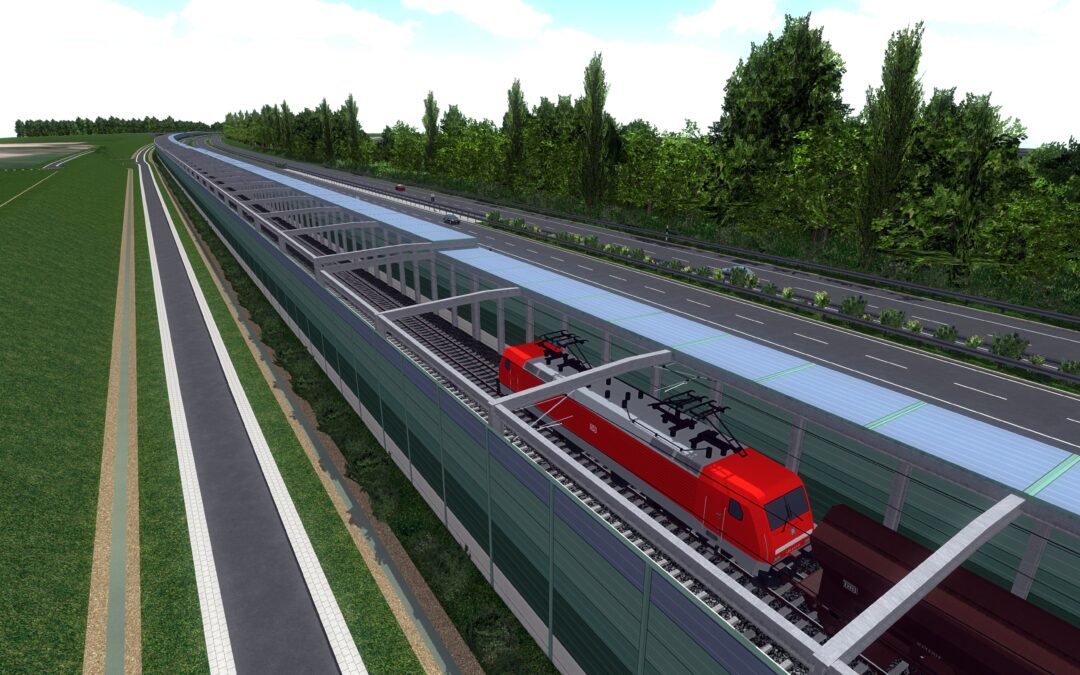 Red passenger train on an elevated track beside a multi-lane highway with dense trees and a blue sky.